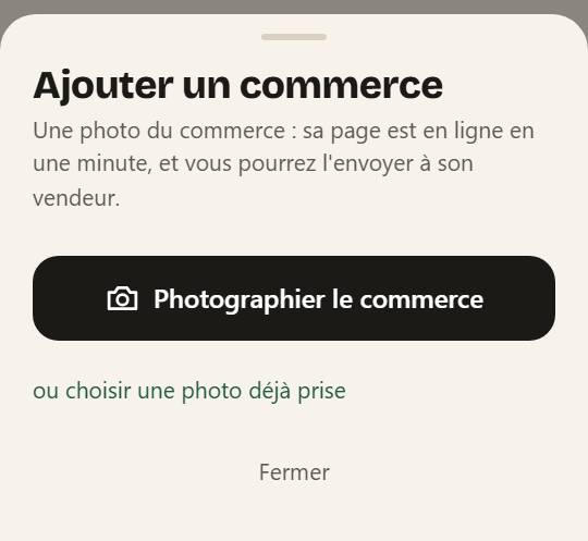La feuille « Ajouter un commerce » : une phrase, le bouton « Photographier le commerce » et le lien « ou choisir une photo déjà prise ».
